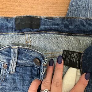 Women's Buckle Black Blue Jeans